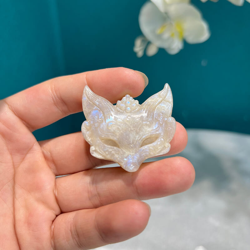 Moonstone fox carving illustrating spiritual symbolism and meaning