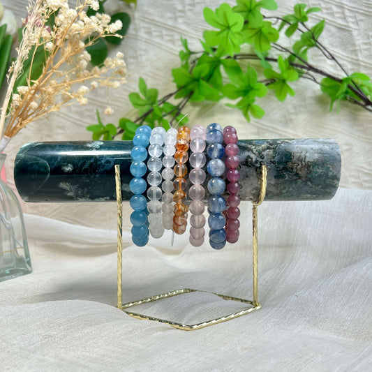 Wholesale moss agate crystal bracelet display holder with natural green inclusions