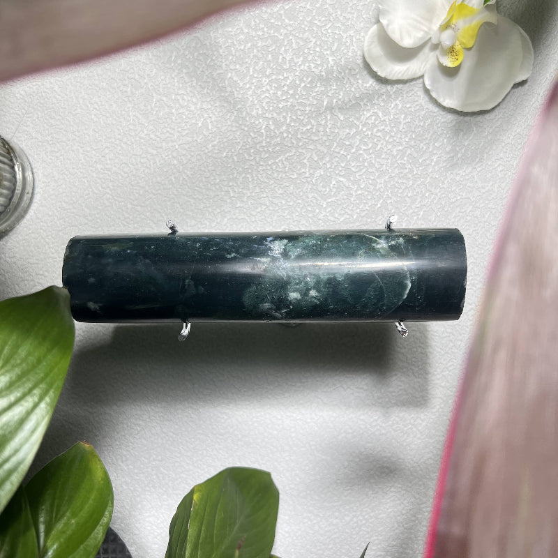 Natural moss agate display showcasing jewelry bracelet presentation