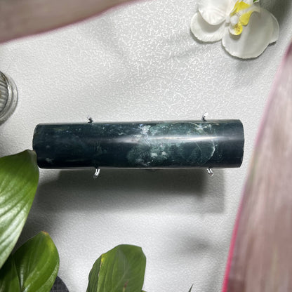 Natural moss agate display showcasing jewelry bracelet presentation