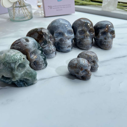 Moss Agate Skull in Meditation Space with Candles