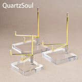 Collection of crystal display stands in various sizes for mineral specimens