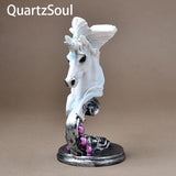 Decorative unicorn crystal sphere holder with silver and pink accents for crystal display collections