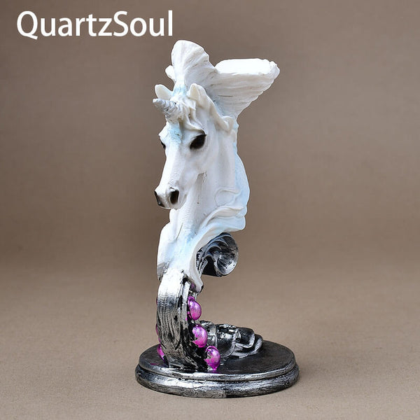 Decorative unicorn crystal sphere holder with silver and pink accents for crystal display collections
