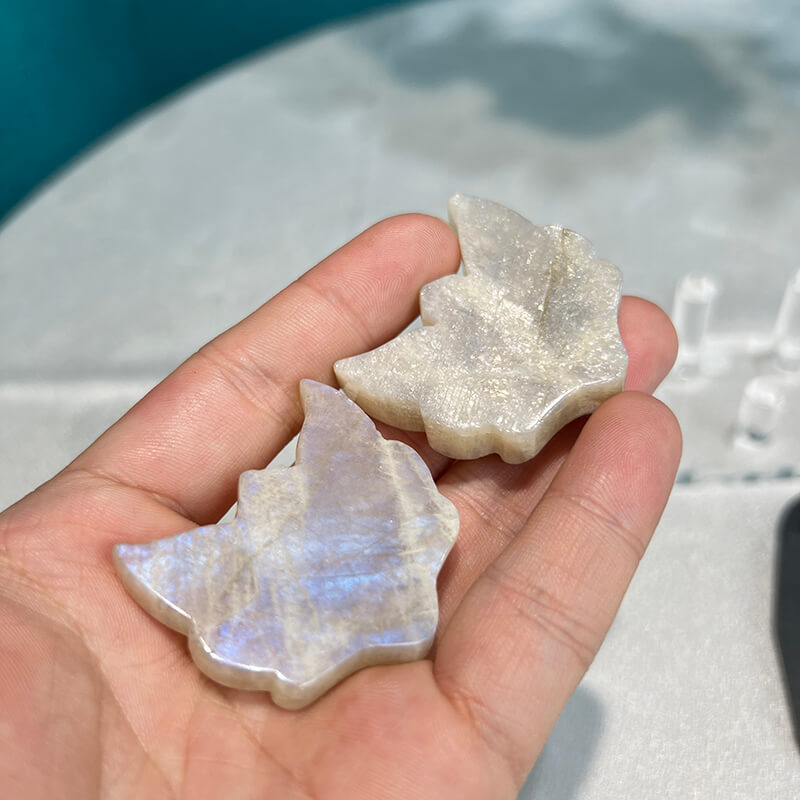 Natural moonstone fox figurine showing unique crystal patterns