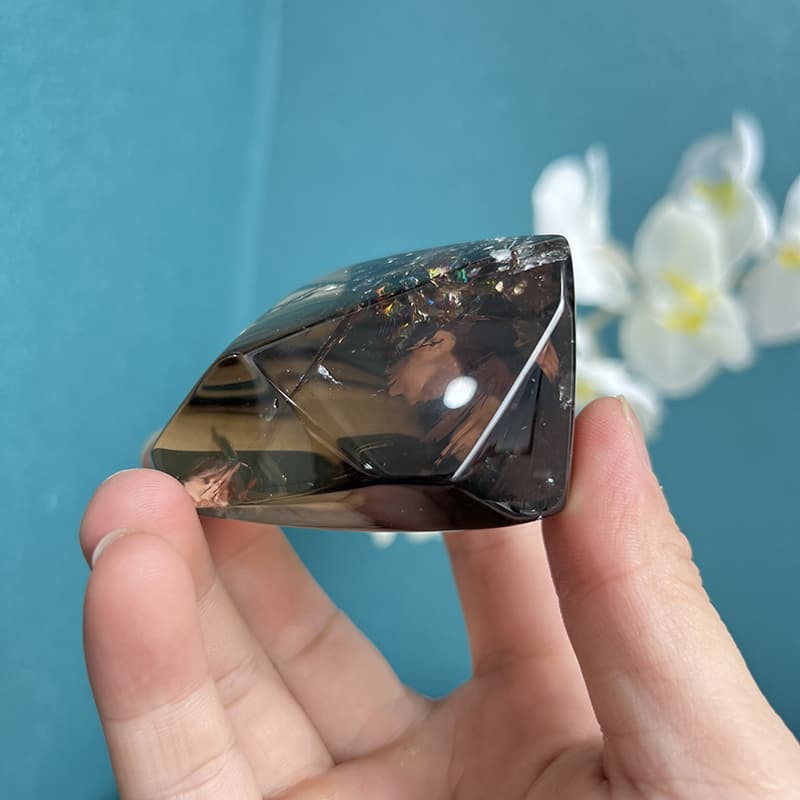 Natural smoky quartz free form showing internal inclusions
