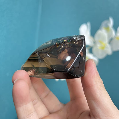 Natural smoky quartz free form showing internal inclusions