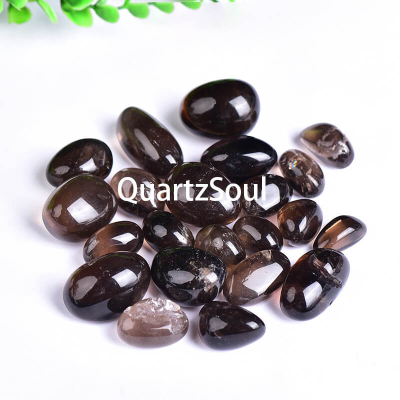 Natural smoky quartz tumbled stones in various sizes and shades