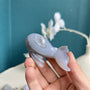 Handcrafted natural whale agate crystal carving with unique healing properties