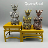 Collection of royal owl crystal display stands in gold, silver and copper finishes