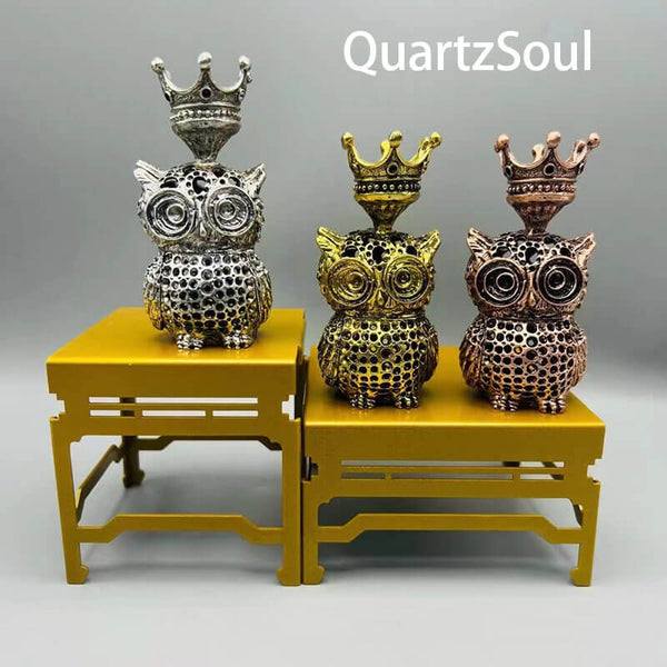 Collection of royal owl crystal display stands in gold, silver and copper finishes