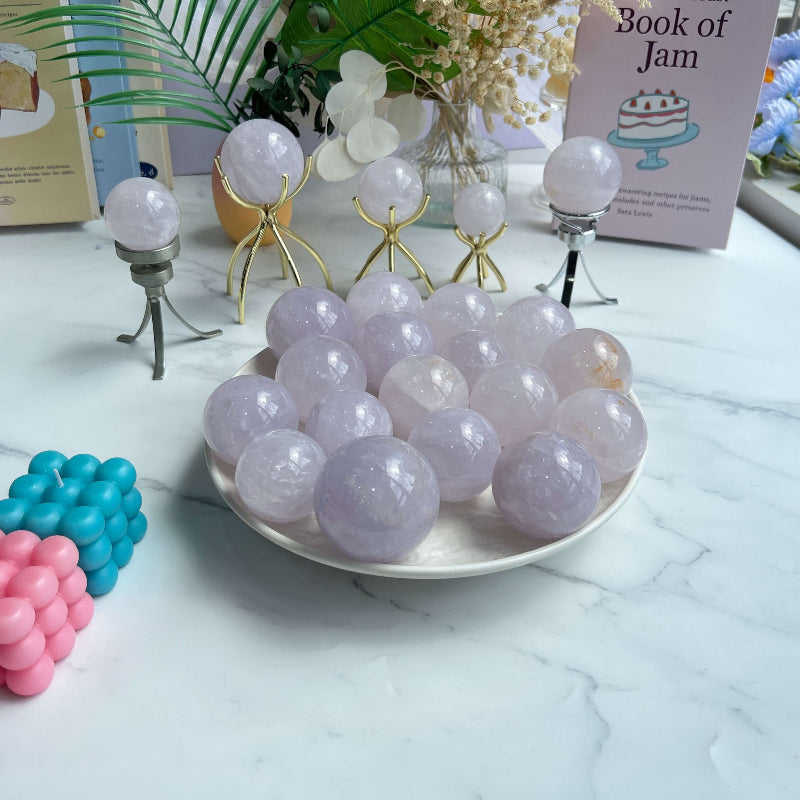 Rose Quartz Crystal Sphere Size Comparison In Hand