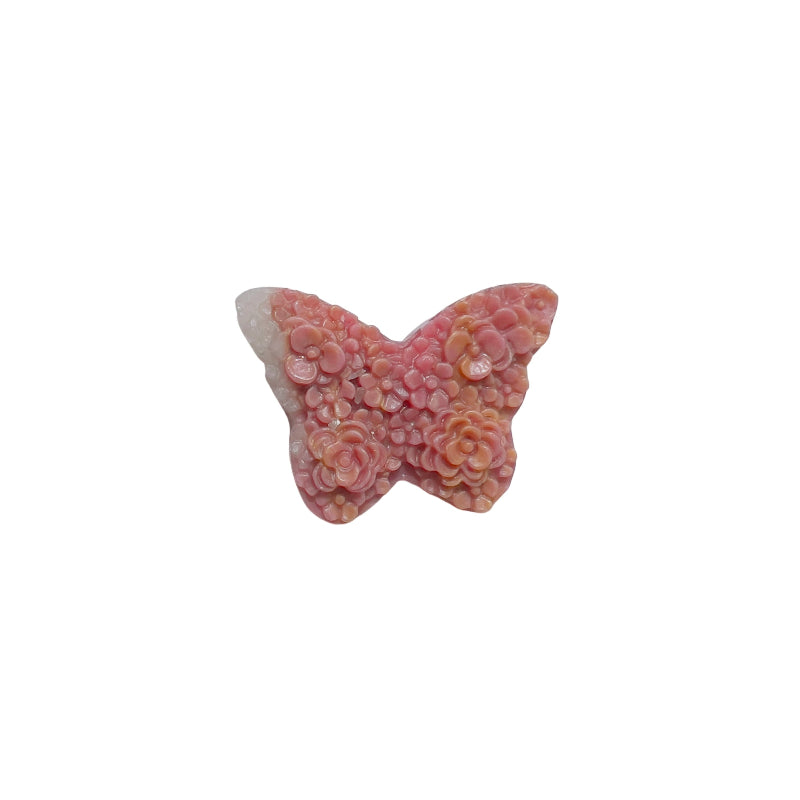 Butterfly shaped rhodonite carving displaying natural pink and black patterns for healing and emotional balance