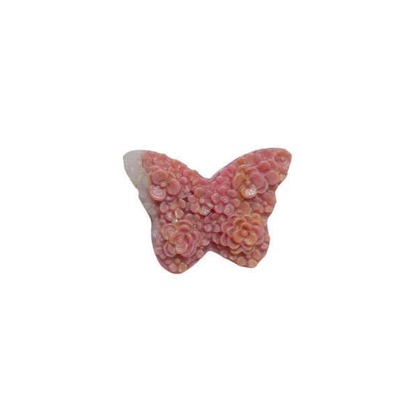 Butterfly shaped rhodonite carving displaying natural pink and black patterns for healing and emotional balance