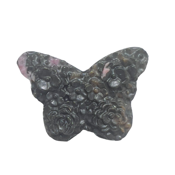 Size comparison of rhodonite butterfly carving with common objects