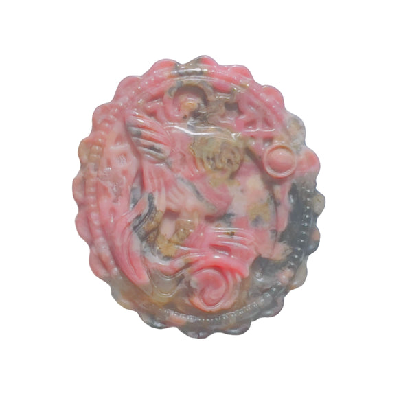 Close-up of pink rhodonite magical girl carved pattern detail