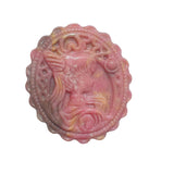 Pink rhodonite crystal carved medallion reverse side showing natural patterns