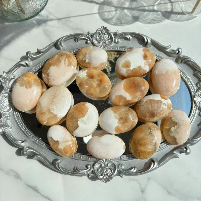 Pink Scolecite Palm Stone Used During Meditation Session
