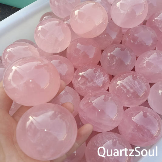 Polished rose quartz crystal spheres for wholesale buyers