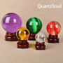 Handcrafted wooden crystal sphere display stand with red cushion top