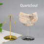 Premium metal crystal display stands in gold and silver with crescent-shaped specimen