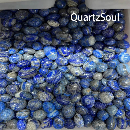 Premium wholesale lapis lazuli tumbled stones with deep blue color and gold pyrite inclusions