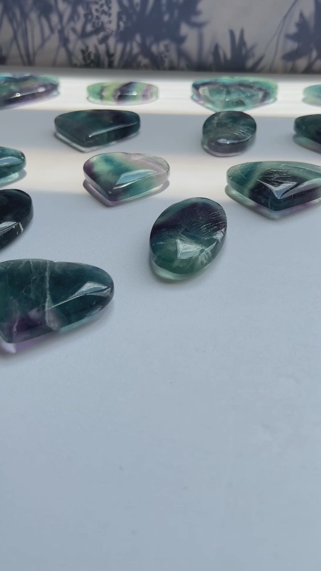 Rainbow fluorite palm stone polished for crystal healing wholesale