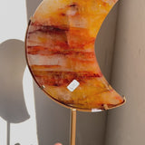 Golden Healer Moon Crystal with light passing through showing transparency and