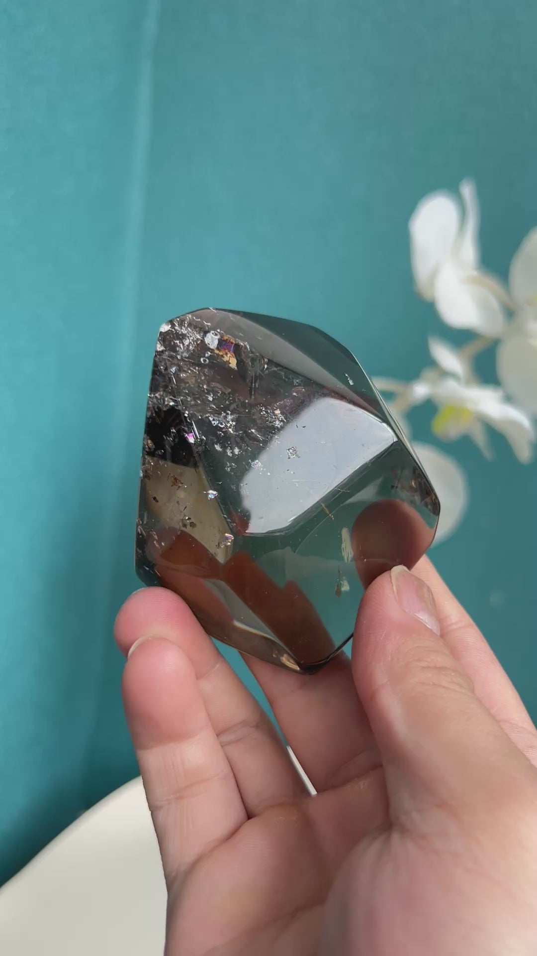 Polished surface of smoky quartz free form crystal