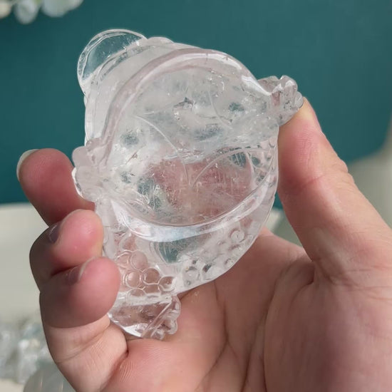 Carved crystal toad as energy activator for wealth corners