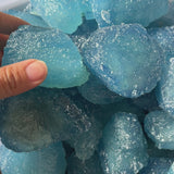 Bulk crystal healing stones featuring natural aquamarine formations