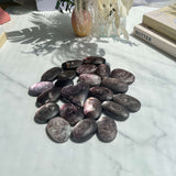 Natural Light Reflecting on Purple Mica Crystal Surface
