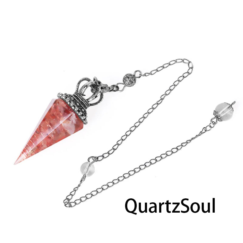 Red Agate crystal pendulum with decorative silver crown