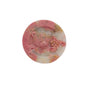 Close up rhodonite bear carving showing natural black matrix pattern