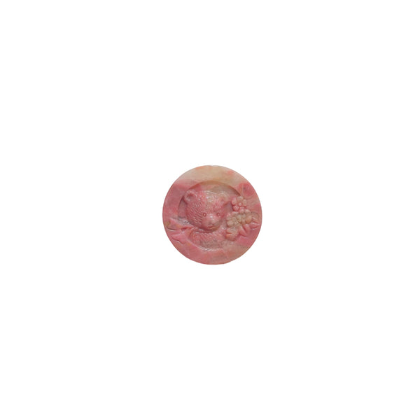 Front view of rhodonite bear carving showing detailed facial features