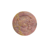 Rhodonite bear carving used as spiritual protection stone in crystal grid