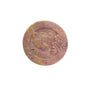 Rhodonite bear carving used as spiritual protection stone in crystal grid