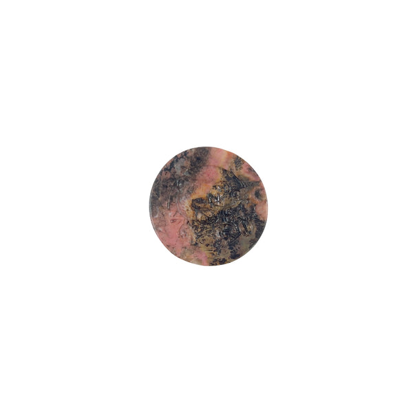 Close up of black veining pattern in rhodonite bear carving crystal