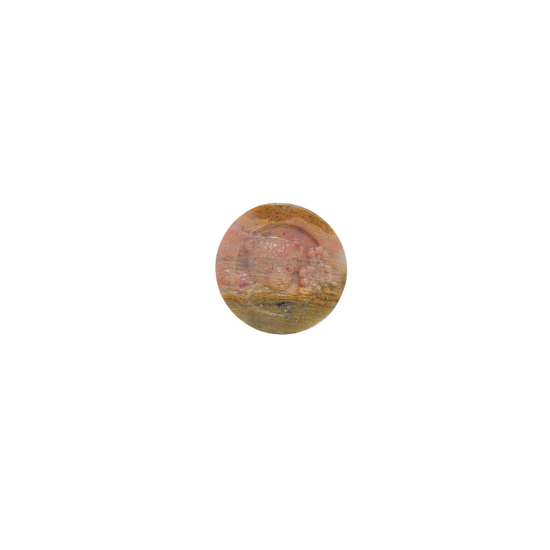 Front view of natural rhodonite bear carving showing detailed facial features