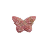 Rhodonite butterfly carving for heart chakra alignment work
