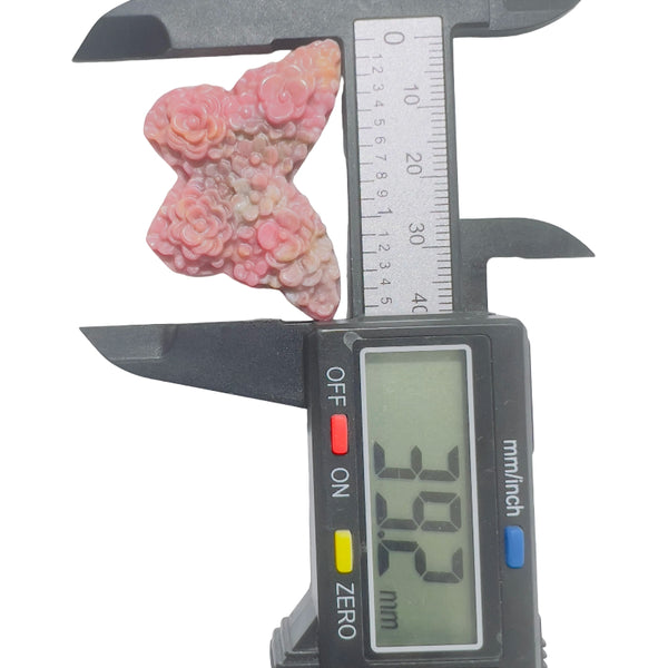 Natural Color Variations in Pink Rhodonite Butterfly Carving