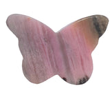 Healing arrangement featuring rhodonite butterfly carving with complementary stones