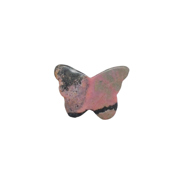 Close-up detail of pink rhodonite butterfly carving showing natural mineral patterns