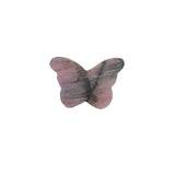 Side view of pink rhodonite butterfly crystal carving showing natural patterns