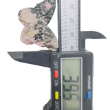 Rhodonite butterfly as centerpiece in crystal healing grid arrangement