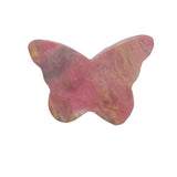 Side profile of pink rhodonite butterfly crystal carving