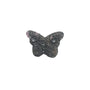 Rhodonite butterfly carving in peaceful meditation setting for emotional healing
