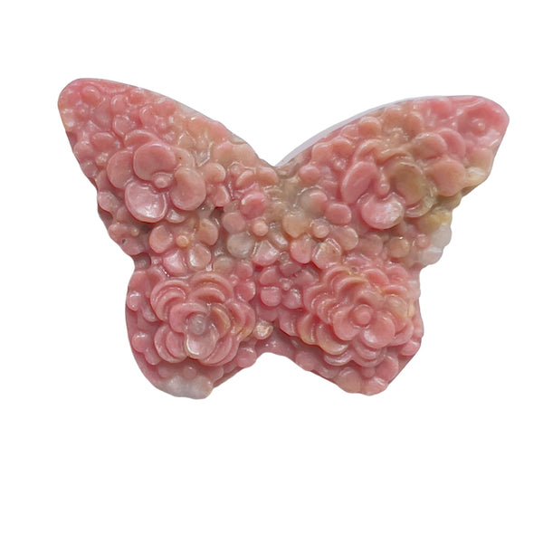 Natural rhodonite butterfly symbolizing transformation and renewal