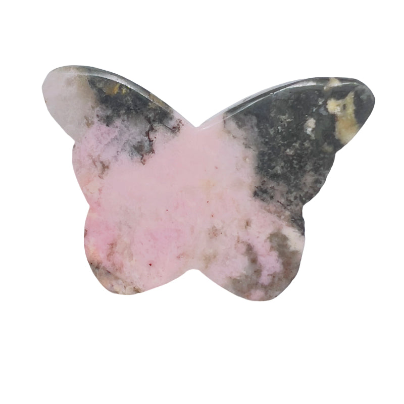 Extreme close-up of rhodonite butterfly wings showing craftsmanship detail