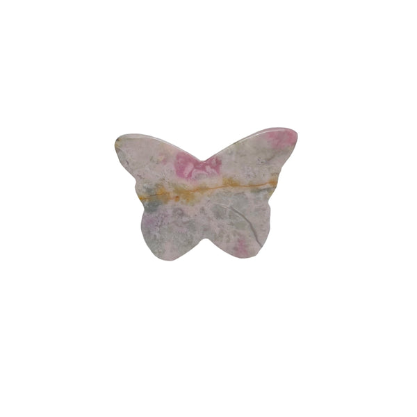 Top view of floral rhodonite butterfly crystal carving with natural patterns